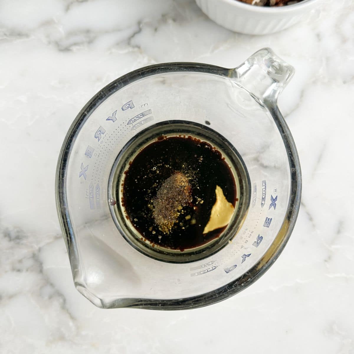 Bowl with vinegar and oil. 