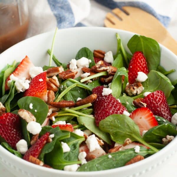 Bowl of strawberry spinach salad.