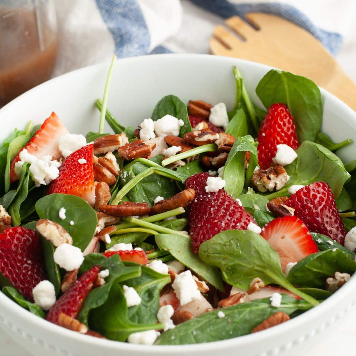 Bowl of strawberry spinach salad. 