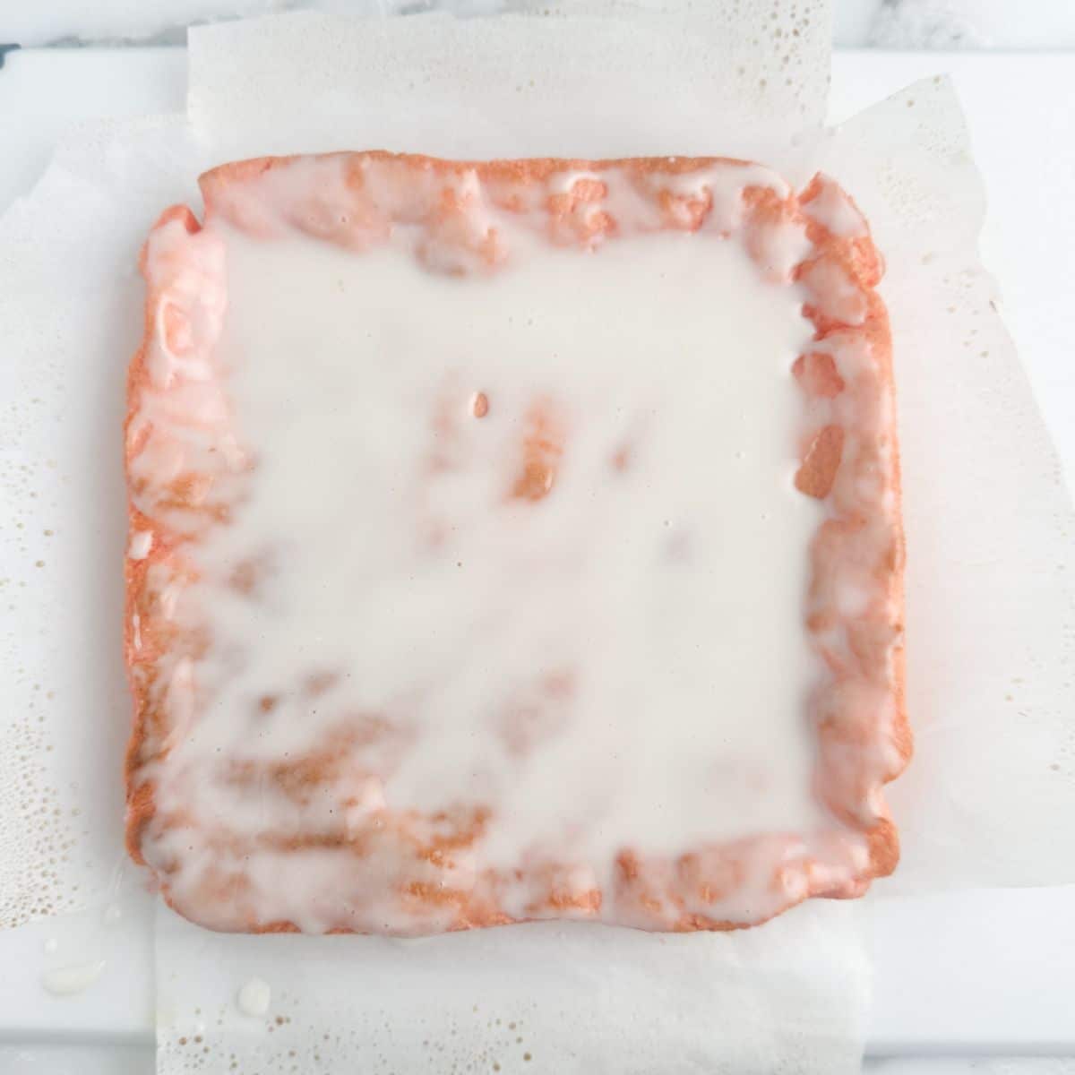 Strawberry bars with a glaze.