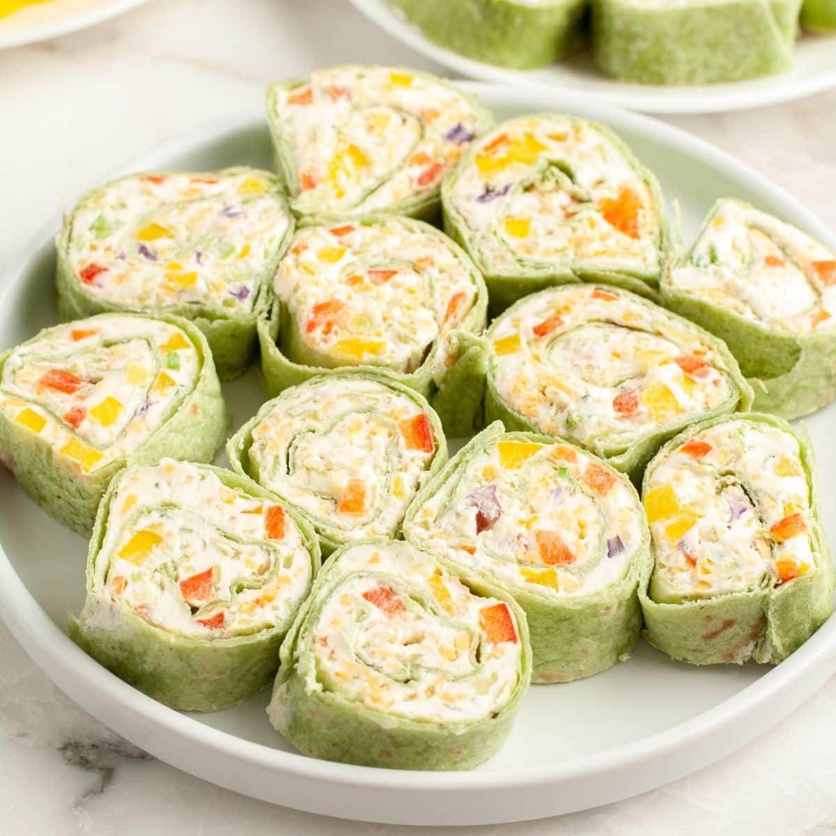 Plate of vegetable pinwheels.