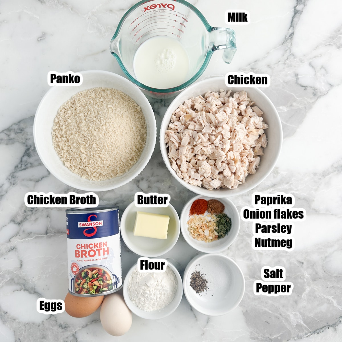 Bowl of diced chicken, panko, milk, butter, seasonings, and chicken broth. 