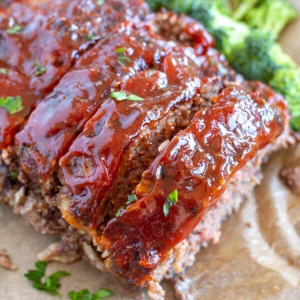 Cooked air fryer meatloaf with sauce.