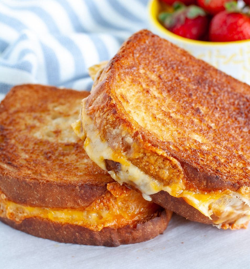 2 grilled cheese sandwiches on a plate