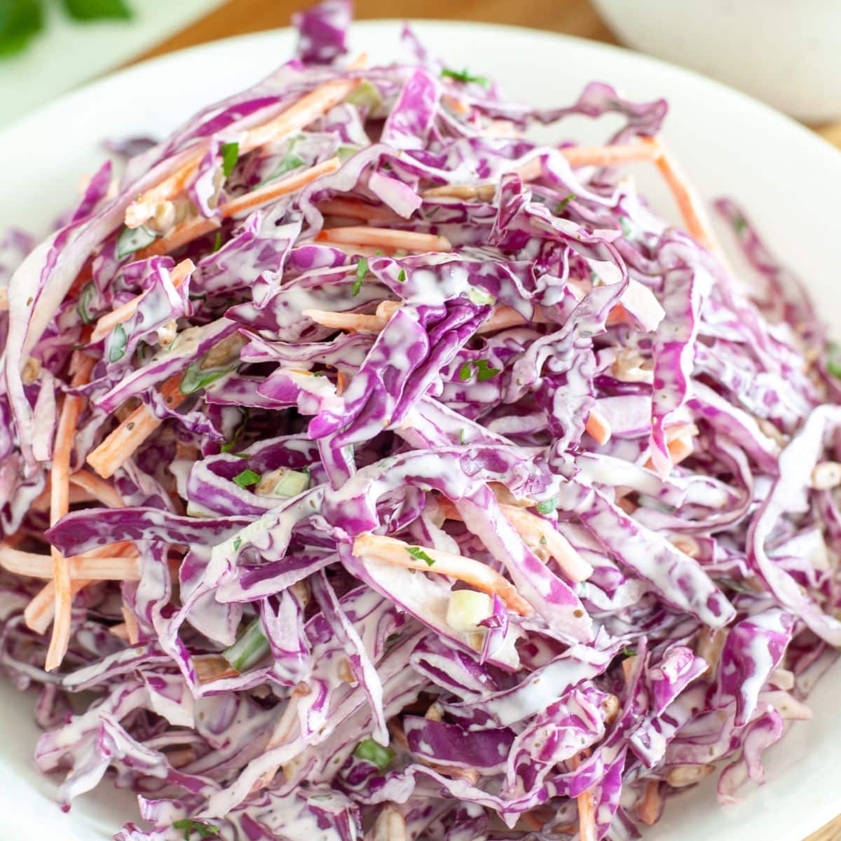 Bowl of red cabbage slaw.