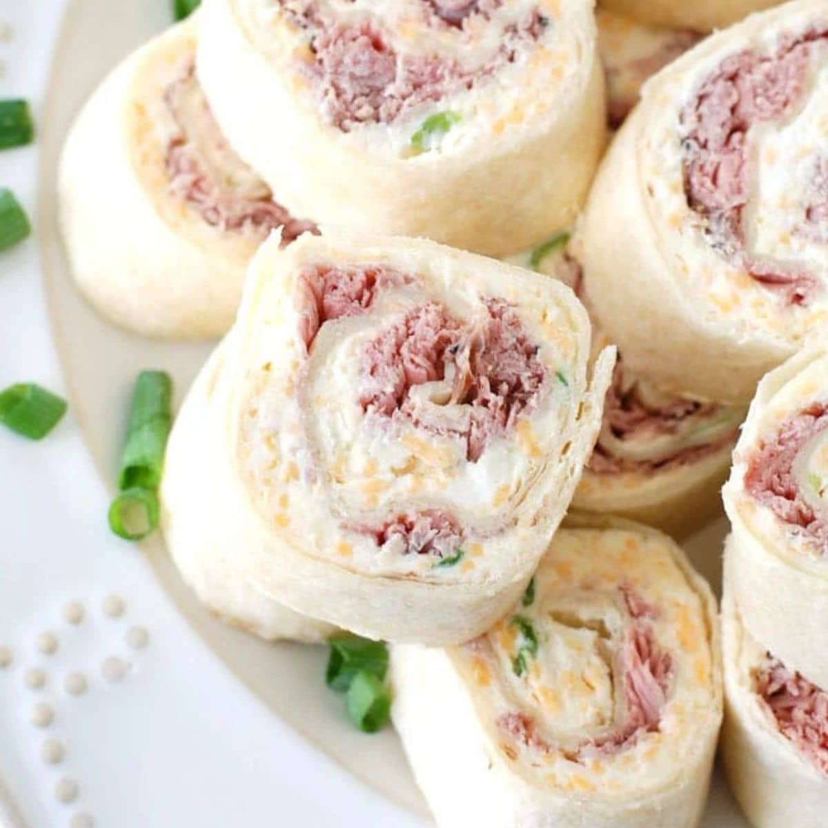 Plate of roast beef roll-ups. 