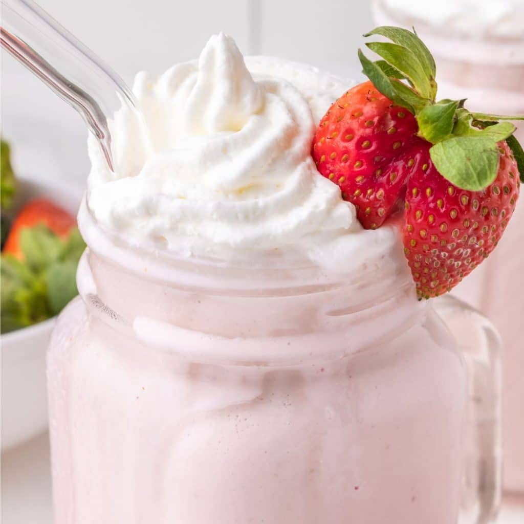 close up shot of strawberry milkshake with whipped cream In a plastic cup  #Ad , #AFFILIATE, #strawberry#mi…