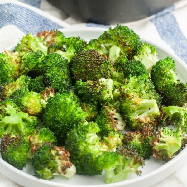 Plate of roasted broccoli.
