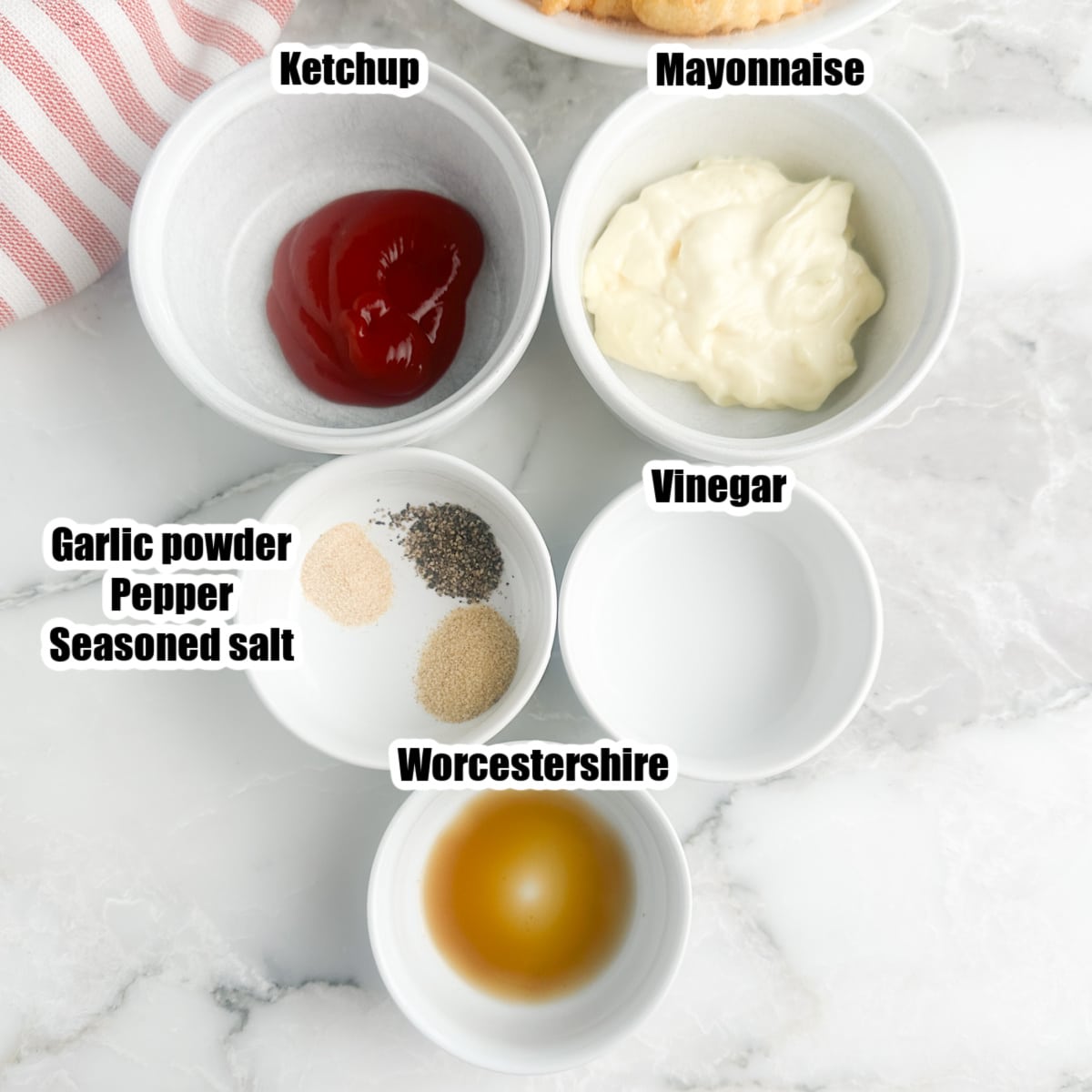 Bowl of ketchup, mayonnaise, vinegar, worcestershire, and seasonings. 