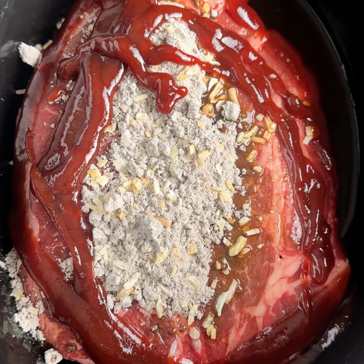 Roast in slow cooker with onion soup mix and bbq sauce. 