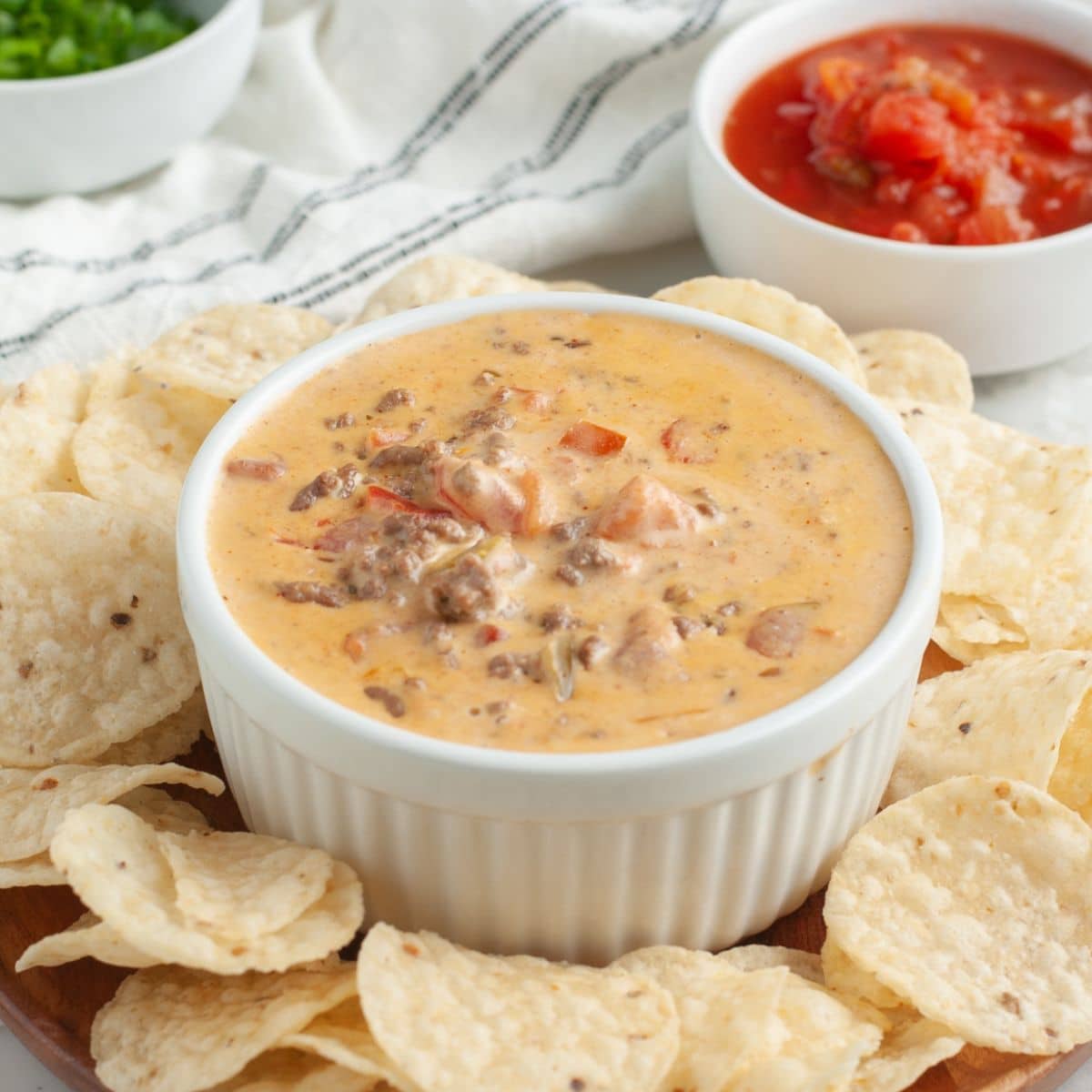 Bowl of hamburger dip with tortilla chips. 