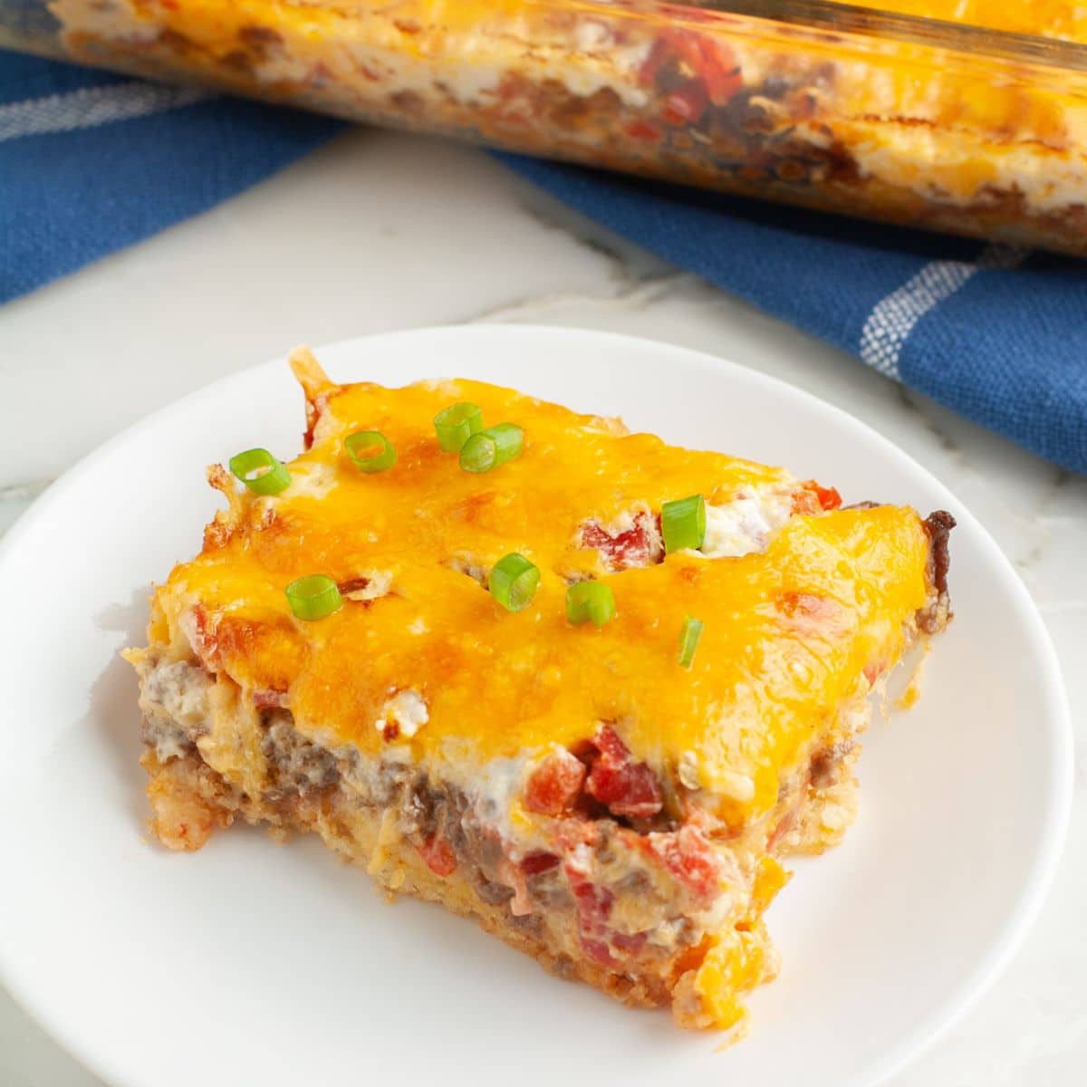 A piece of cattle drive casserole on a plate.