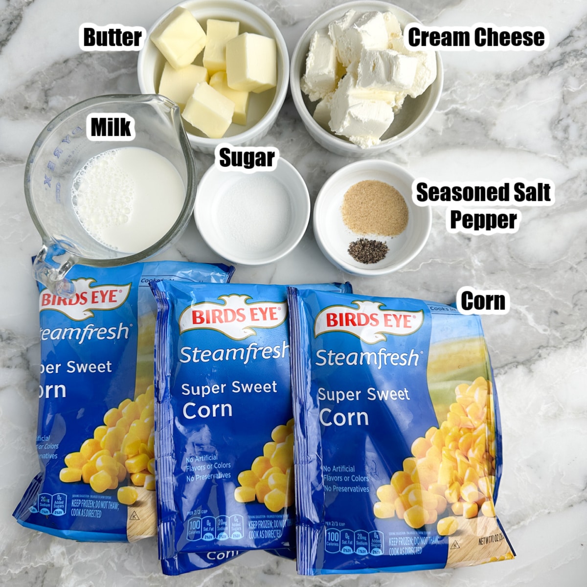 Bags of frozen corn, butter, cream cheese, milk, sugar, and seasonings.