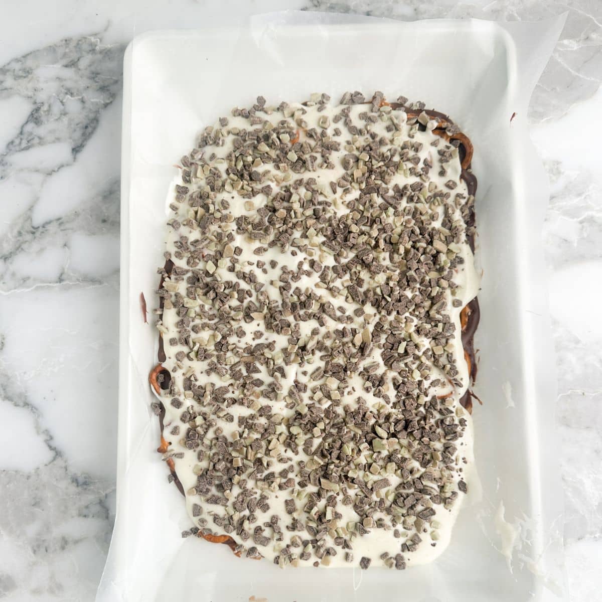 Pretzel bark on a baking sheet. 