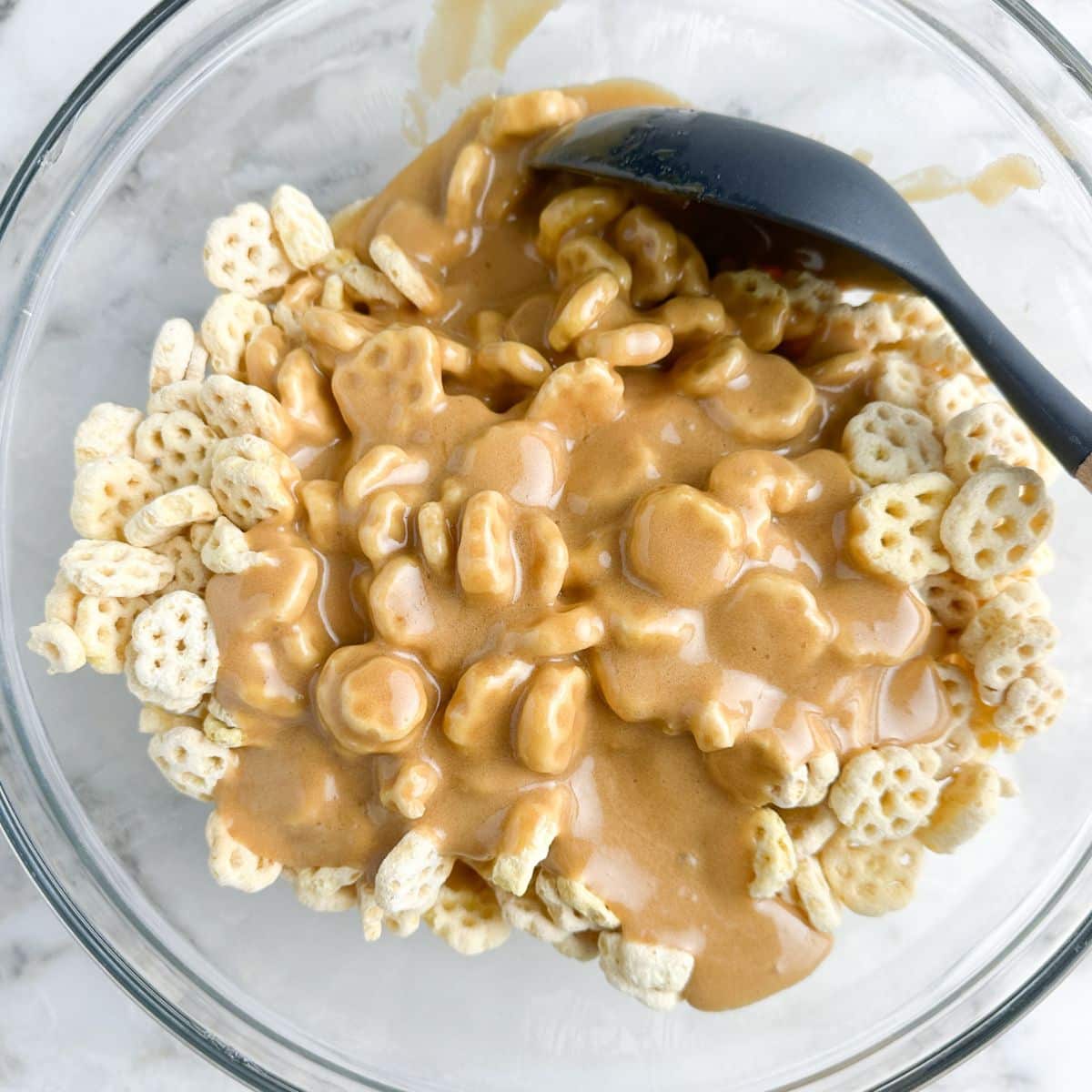 Bowl with cereal and caramel sauce.