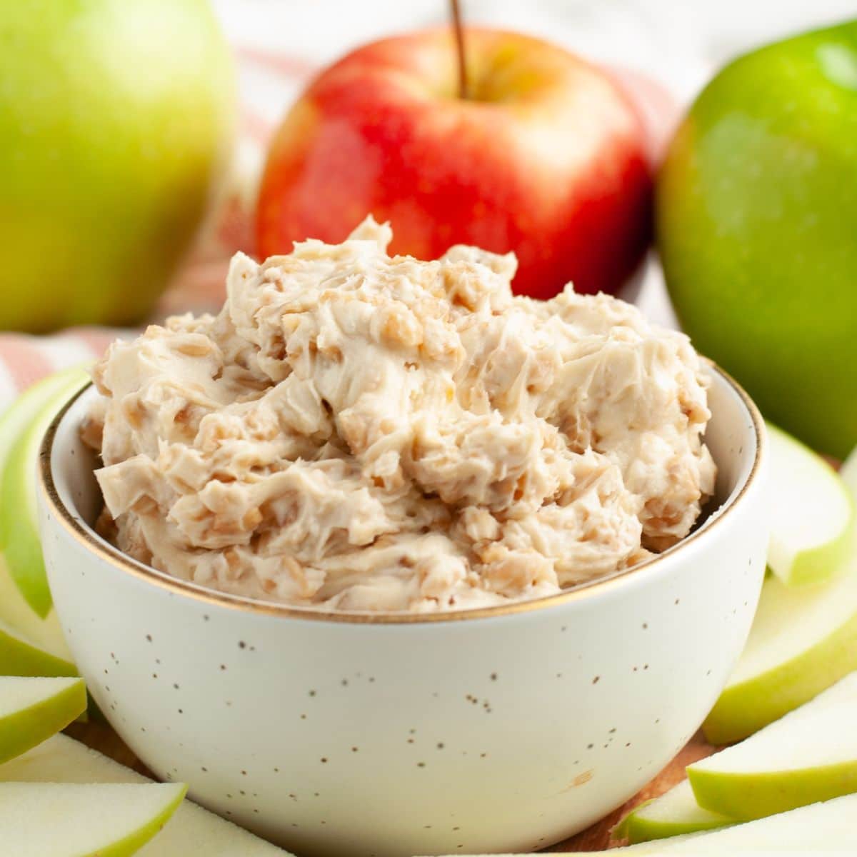 Bowl of toffee dip with apples. 