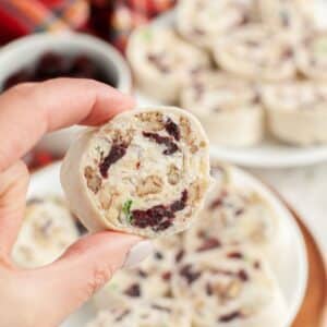 Hand holding a cranberry pinwheel.