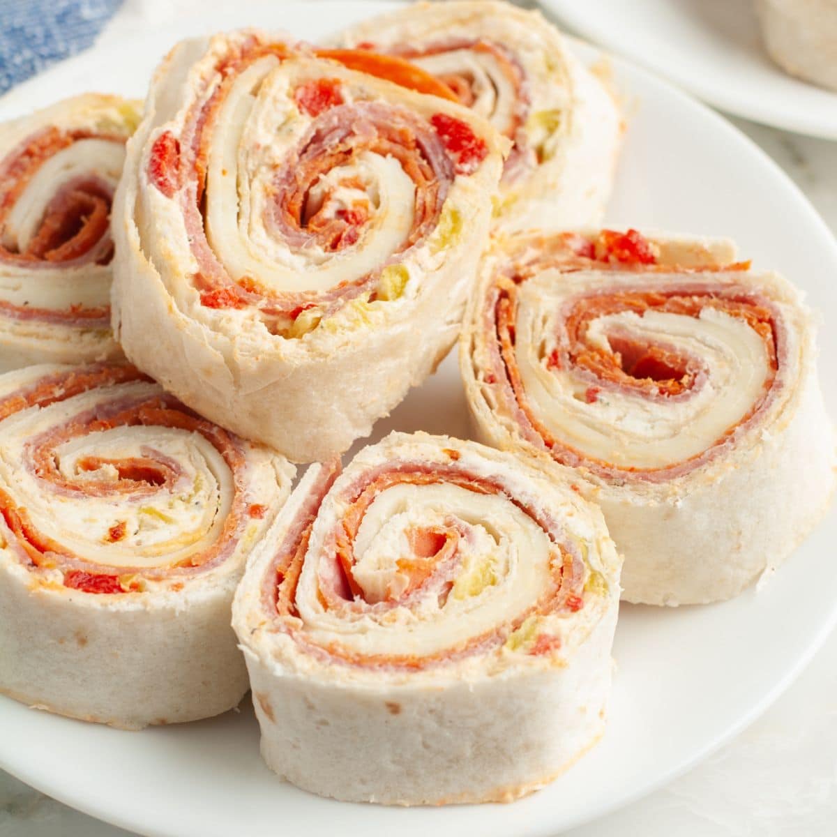 Plate of tortilla pinwheels.