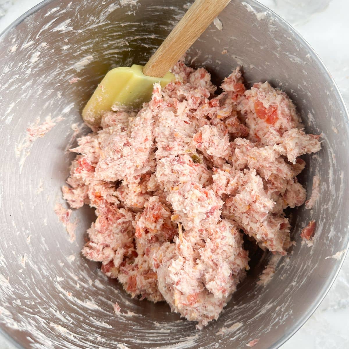 Sausage ball mixture in a mixing bowl. 