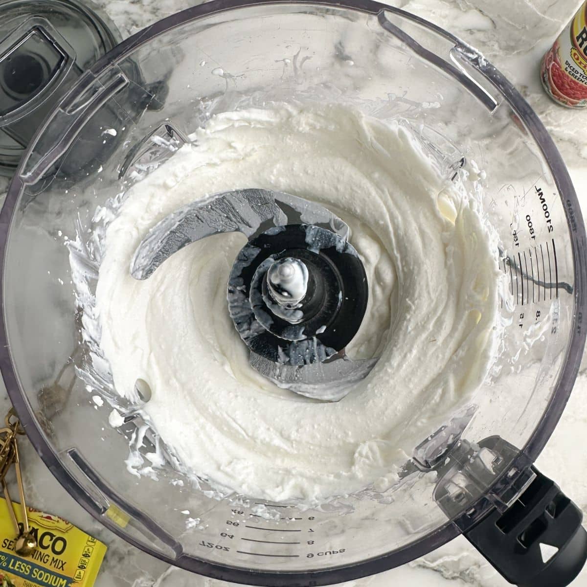 Food processor with creamed cottage cheese.