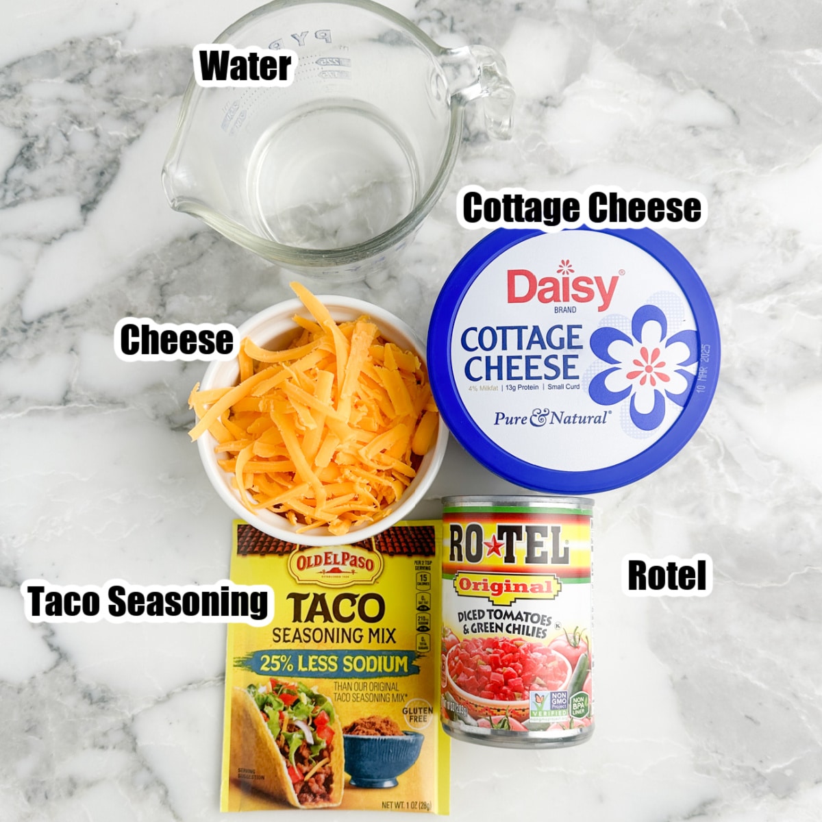 Bowl of cheese, cottage cheese, taco seasonings, can of Rotel, and water.