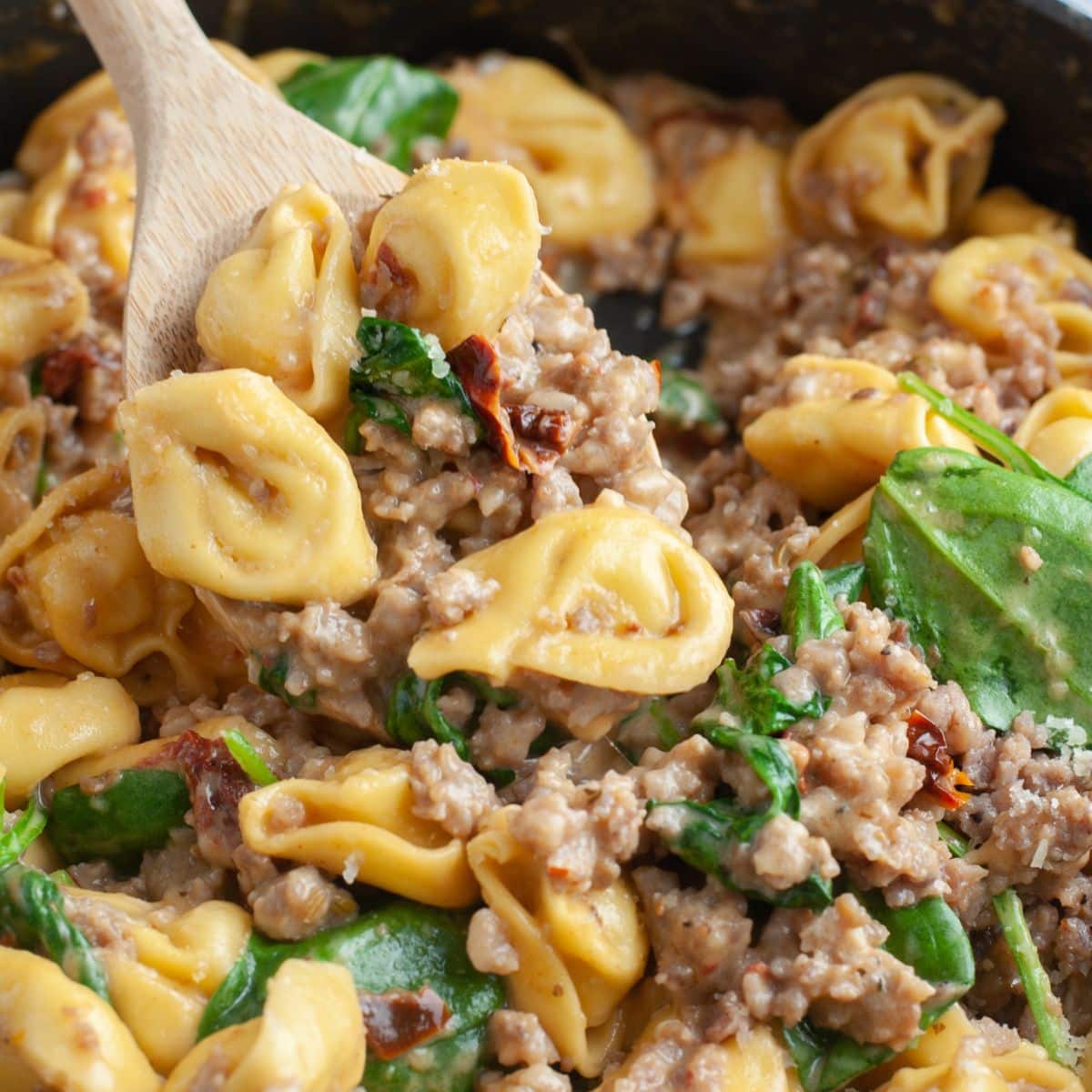 Tortellini with sausage and spinach. 