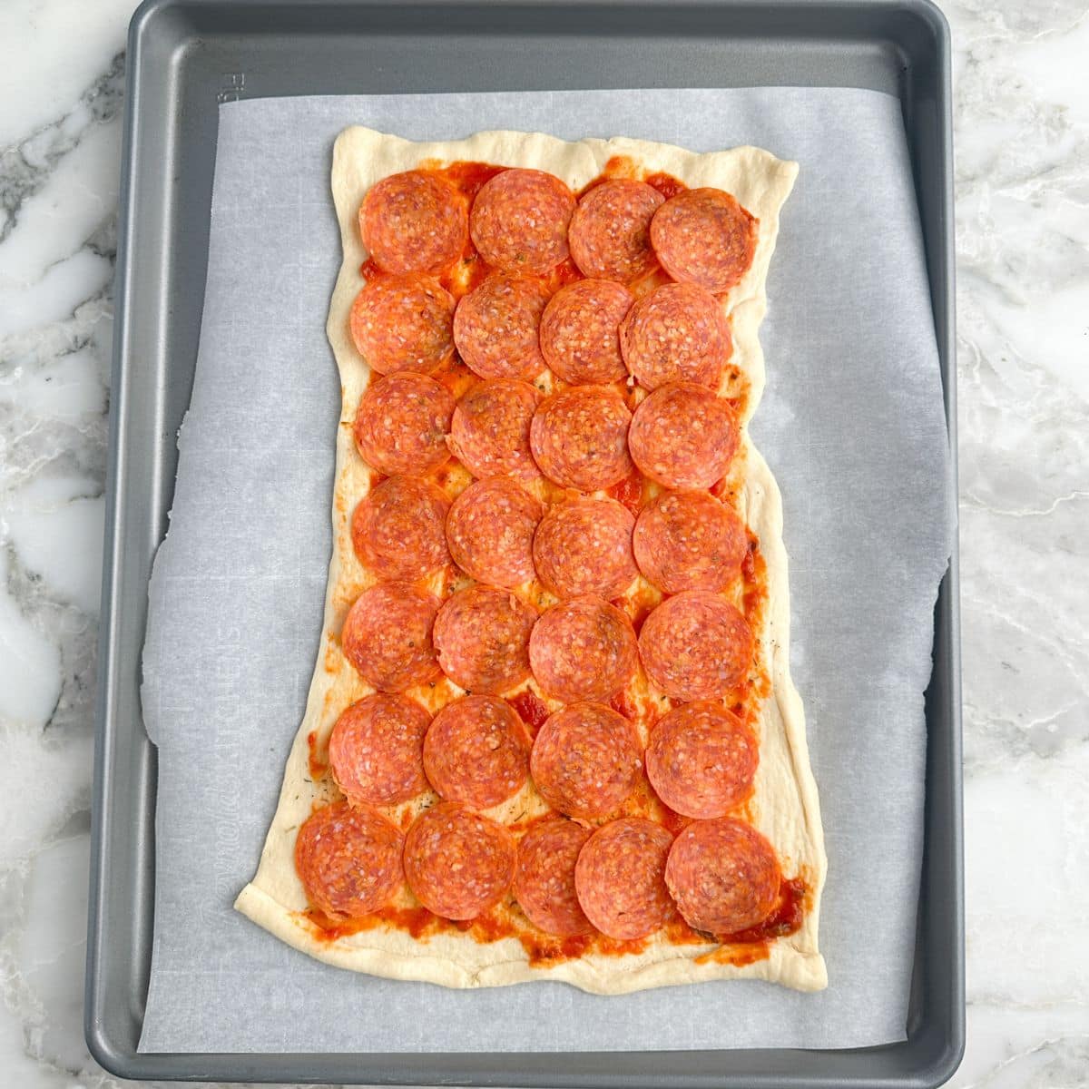 Crescent dough topped with pepperoni. 