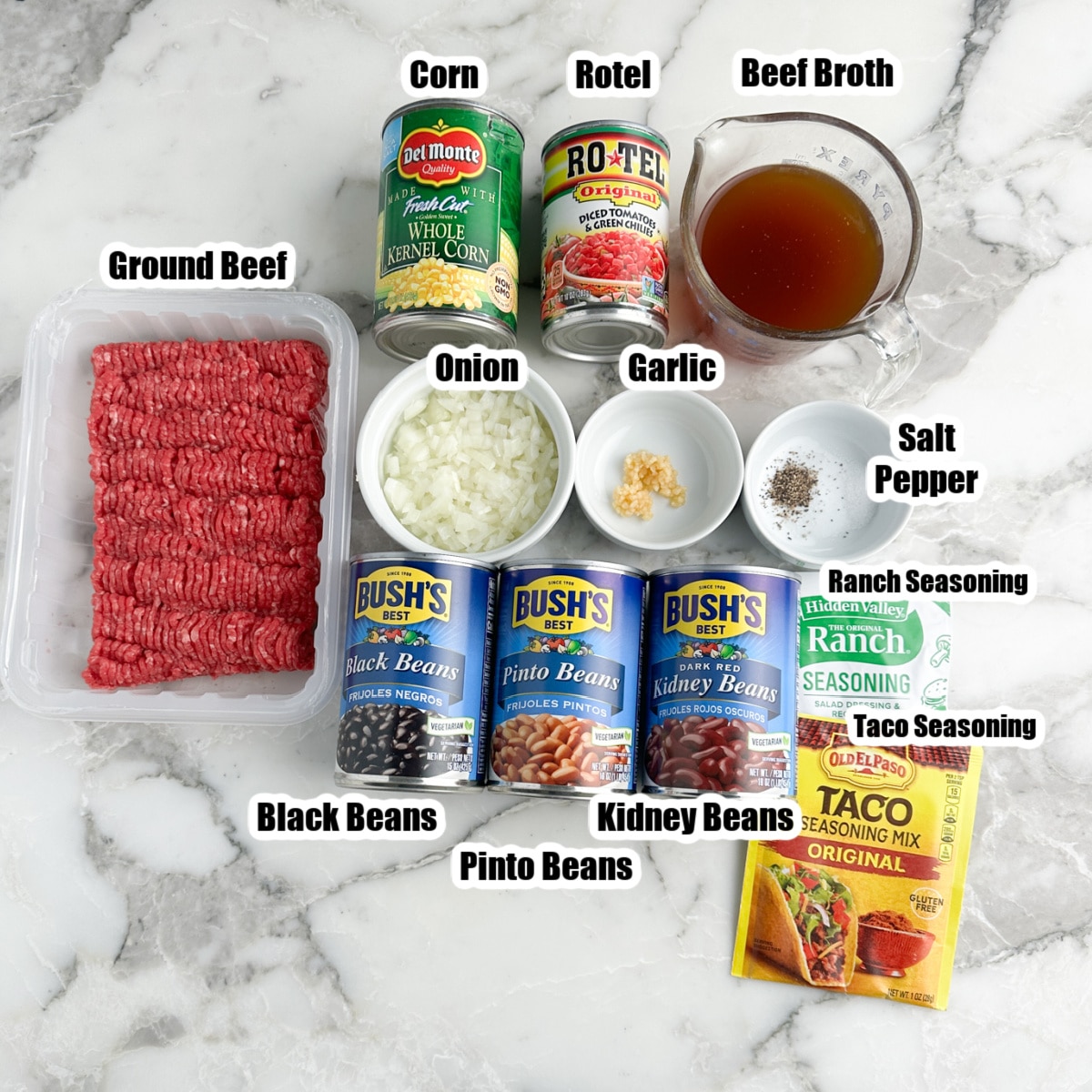 Ground beef, cans of beans, corn, seasonings, and beef broth. 