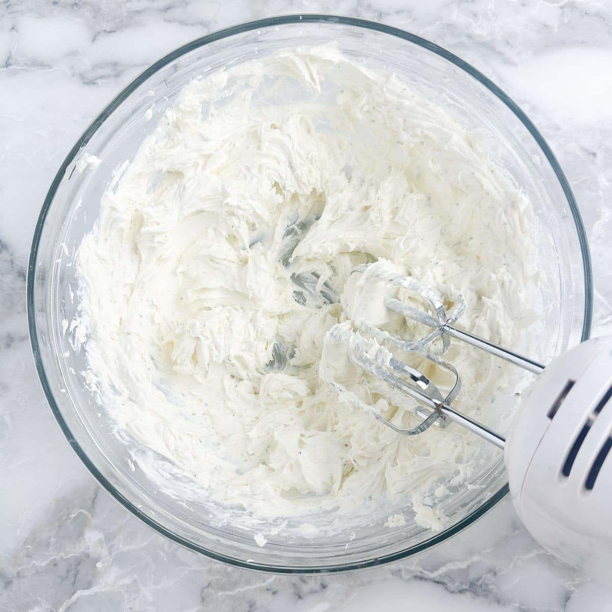 Bowl of mixed cream cheese. 