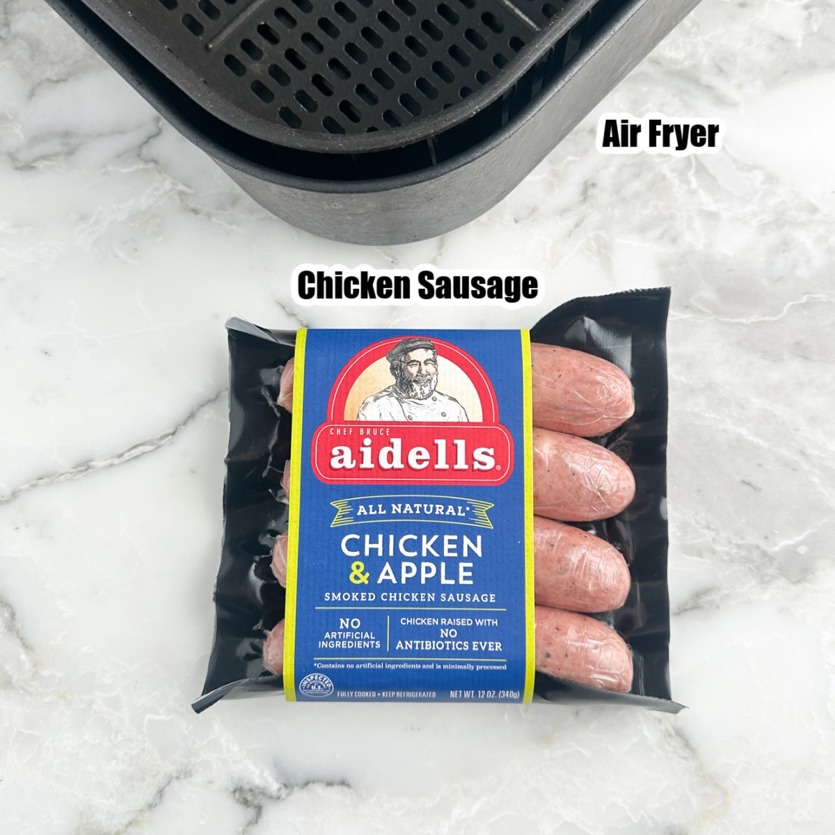 Package of chicken sausage and an air fryer basket. 