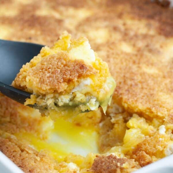 Spoon with lemon dump cake.